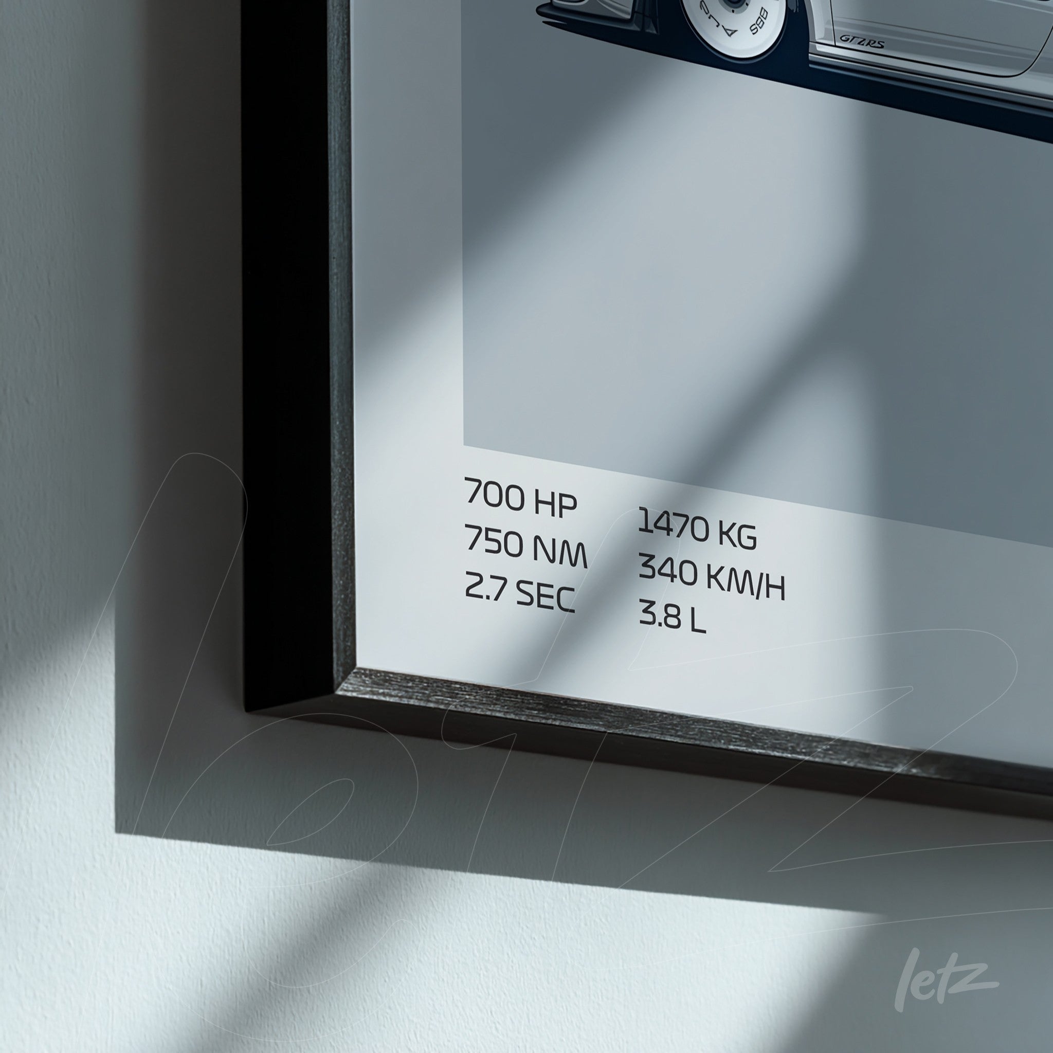 framed minimalist wall art of a sports car with black frame showcasing technical specifications in clear text
