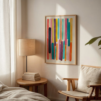 framed abstract wall art with vibrant colors displayed on a light wall
