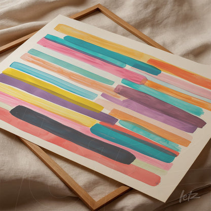 poster print featuring wide brush strokes in pink, blue, yellow, and purple placed on light fabric and surrounded by a light wood frame