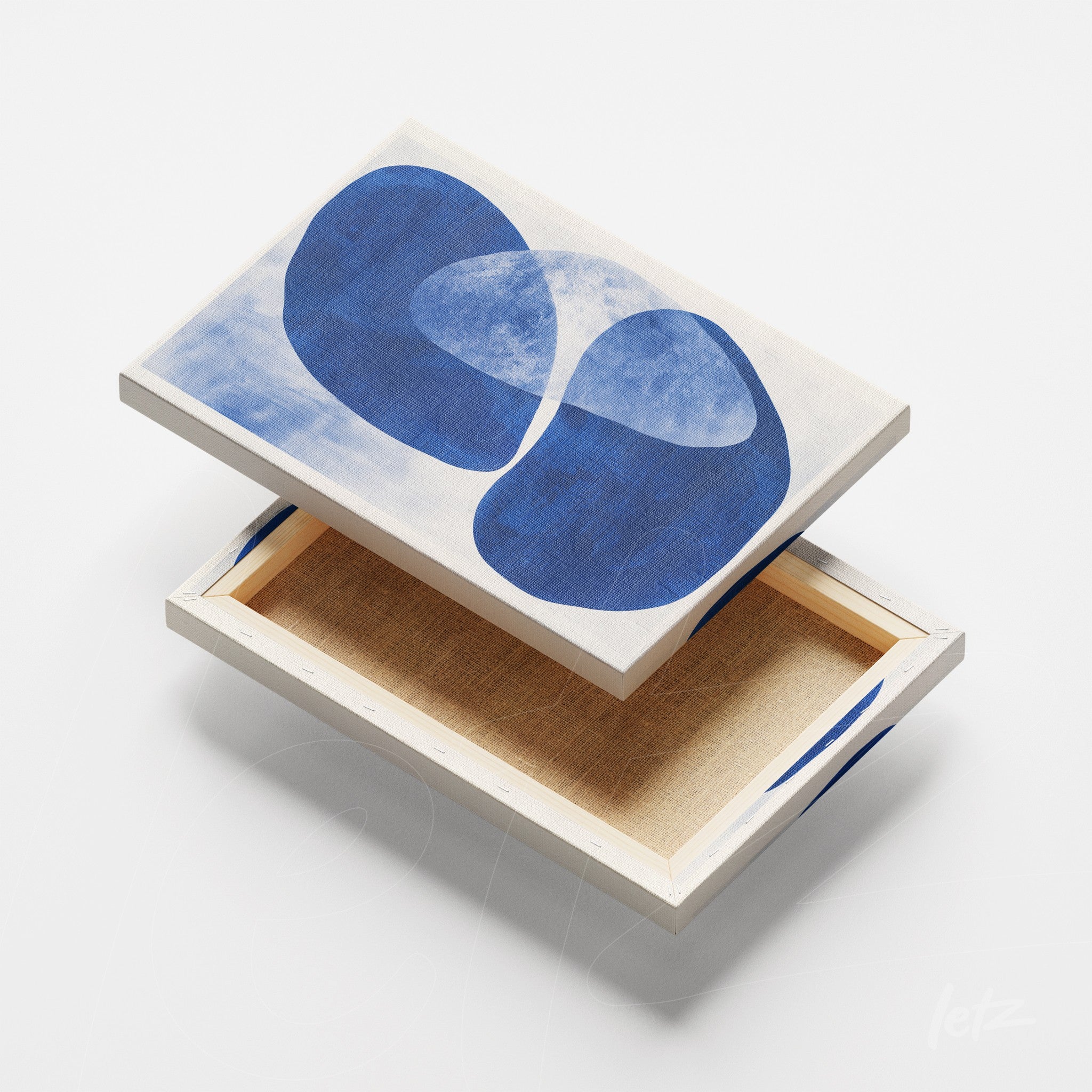 canvas print featuring abstract shapes in blue tones on a light background