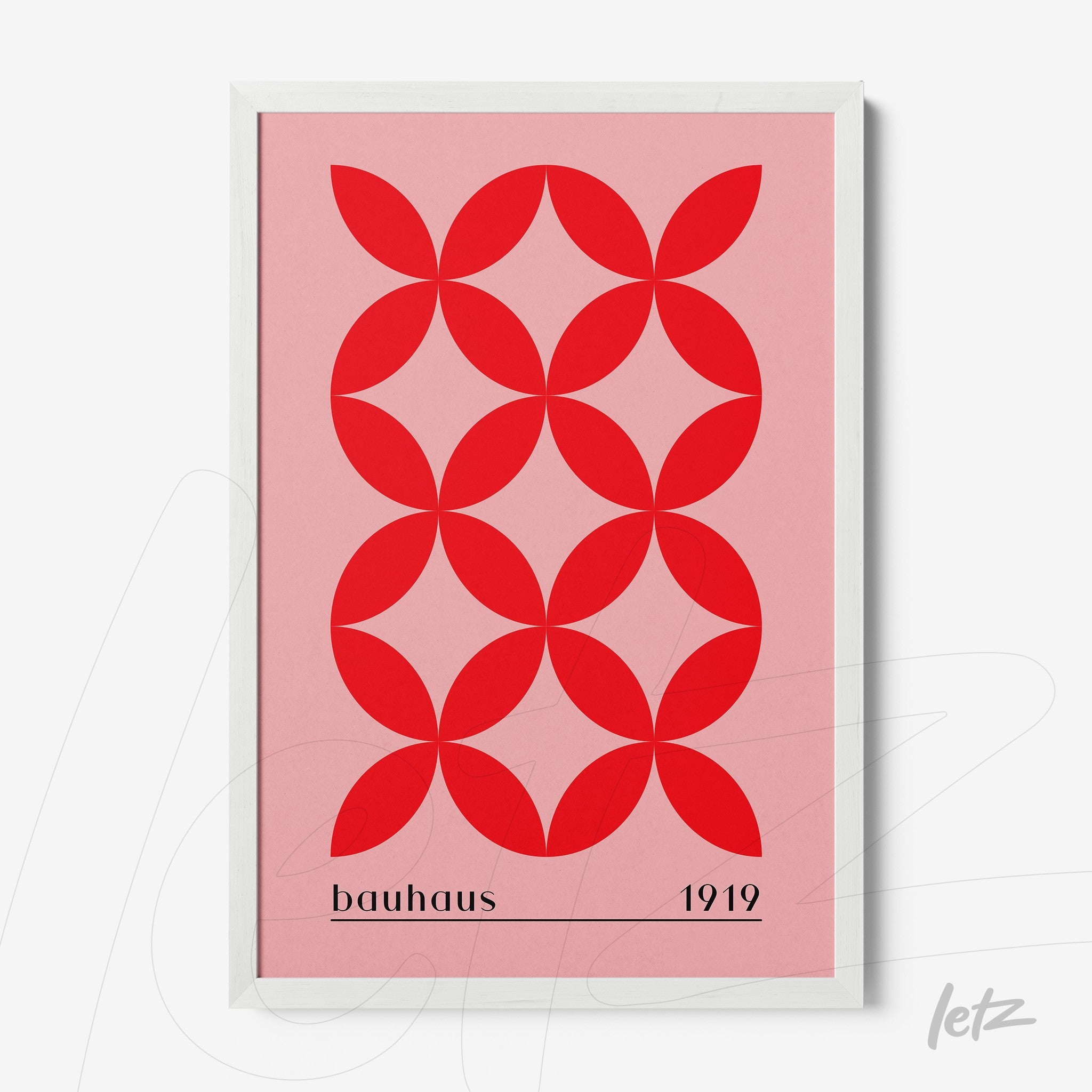 poster print with red geometric pattern on pink background and white frame