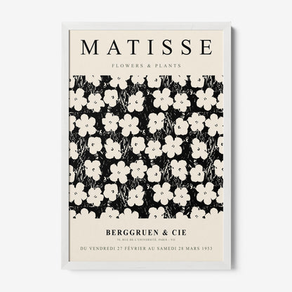 framed wall art featuring retro floral design with black background and white flowers