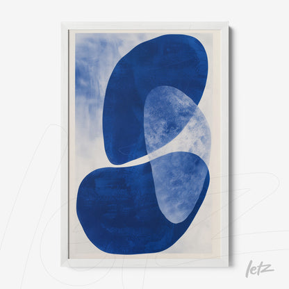 abstract wall art in blue shades framed in white