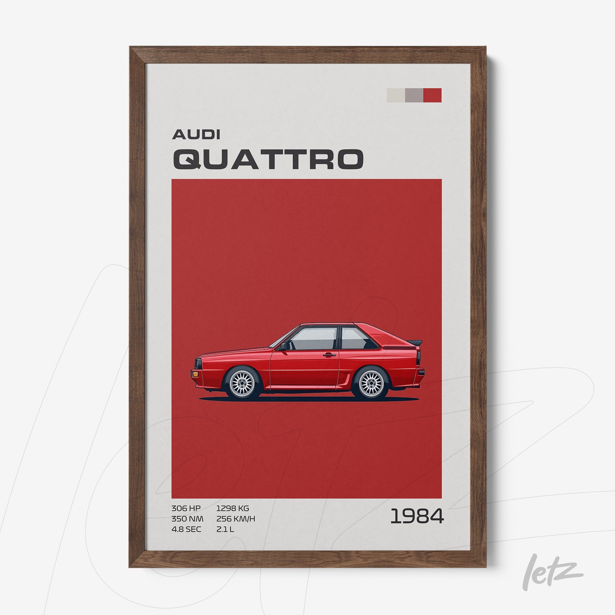 framed graphic art of the 1984 Audi Quattro in red background with dark wooden frame