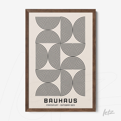 canvas with bauhaus style geometric art in dark wood frame