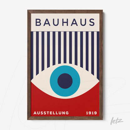 bauhaus style framed artwork featuring a large central blue eye and vertical lines with dark wooden frame
