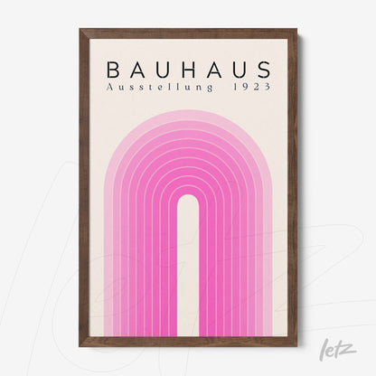 framed art featuring a pink arch design on a beige background with dark wood frame
