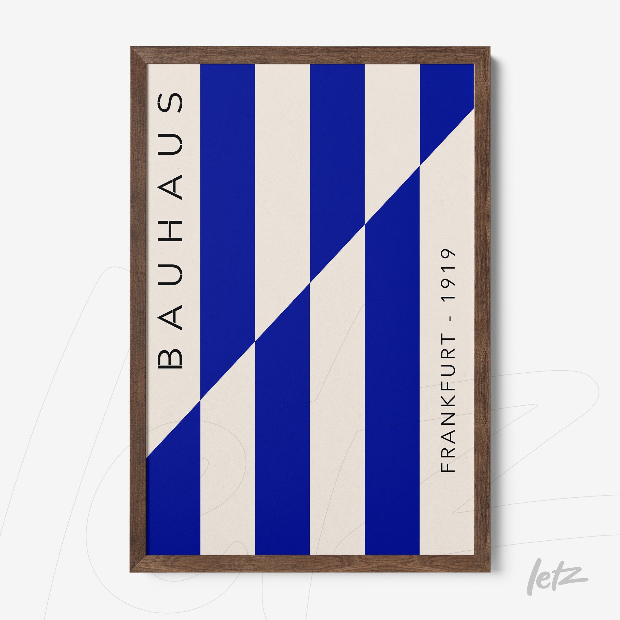 poster print with geometric blue and white bauhaus style design in dark wood frame