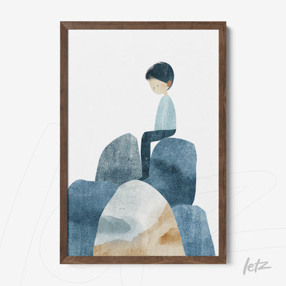 framed wall art featuring a soft illustration of a boy sitting on rocks in shades of blue and brown with a dark wood frame