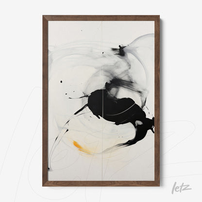 abstract wall art in black and white with a touch of yellow, framed in dark wood