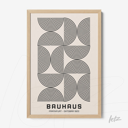 minimalist bauhaus style geometric poster with concentric circles in light wood frame