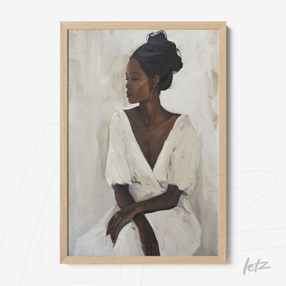 framed portrait of a black woman in a white dress with light wood frame
