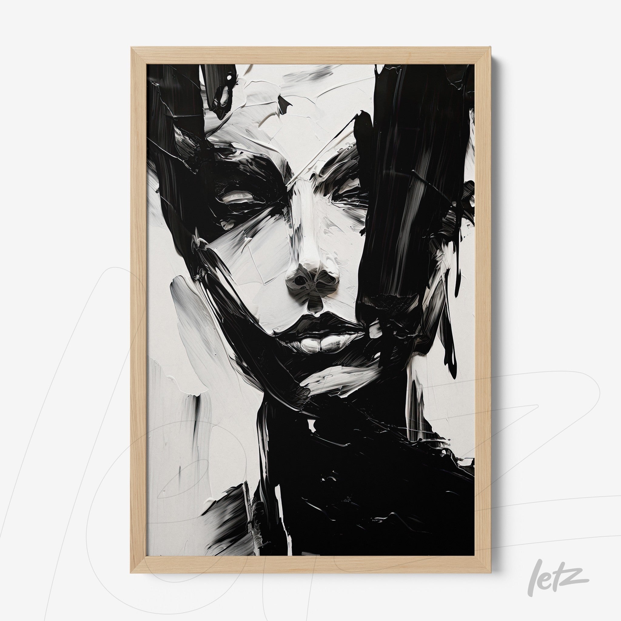framed abstract portrait in black and white with light wood frame