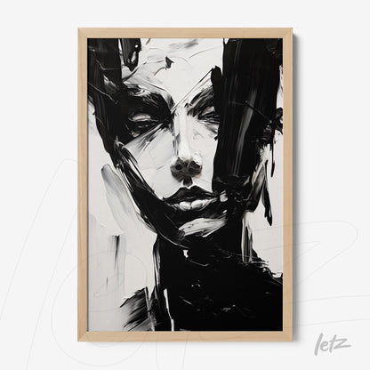 framed abstract portrait in black and white with light wood frame