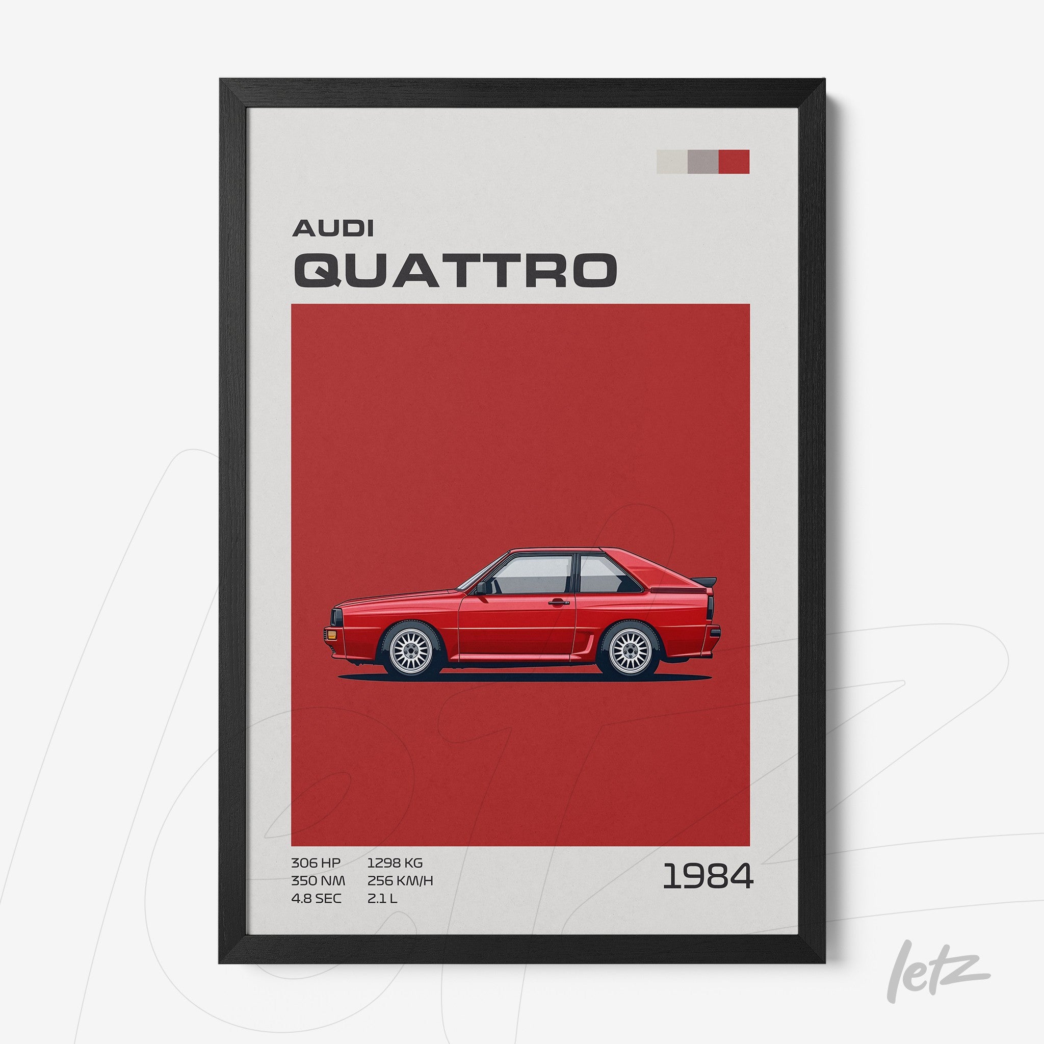 framed artwork featuring the Audi Quattro car illustration on a red background with black frame