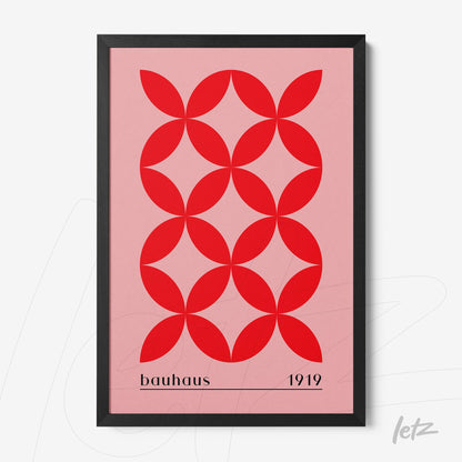 poster of red geometric art on pink background with thin black frame