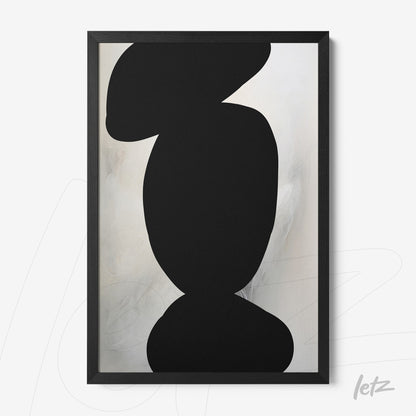 framed abstract art featuring organic black shapes on light background