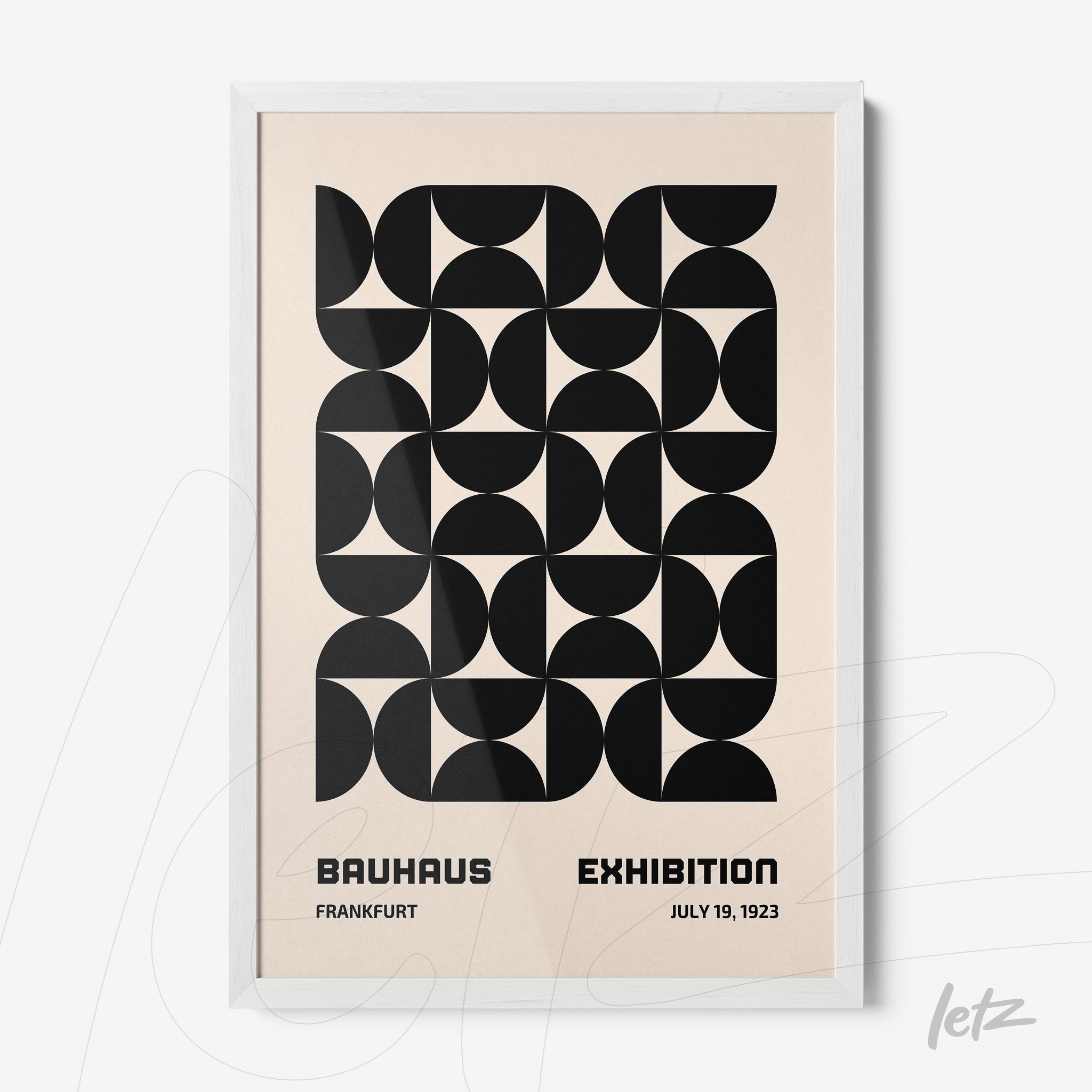 poster with black and white geometric Bauhaus style art displayed in a white frame