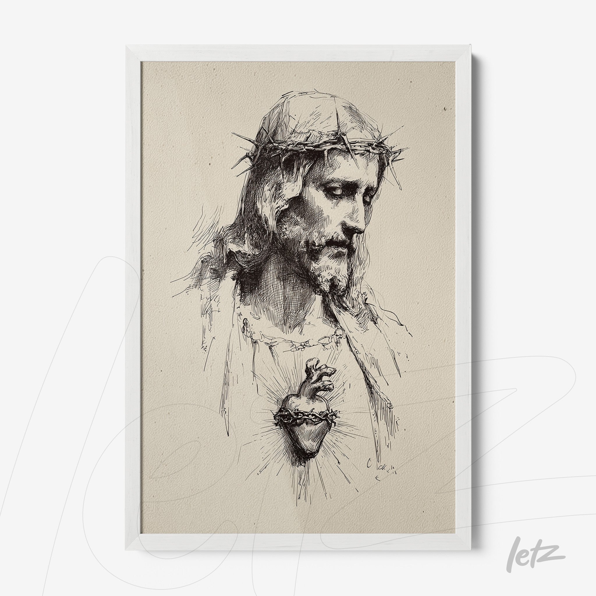 framed black and white artwork of Christ with a crown of thorns and exposed heart in white frame