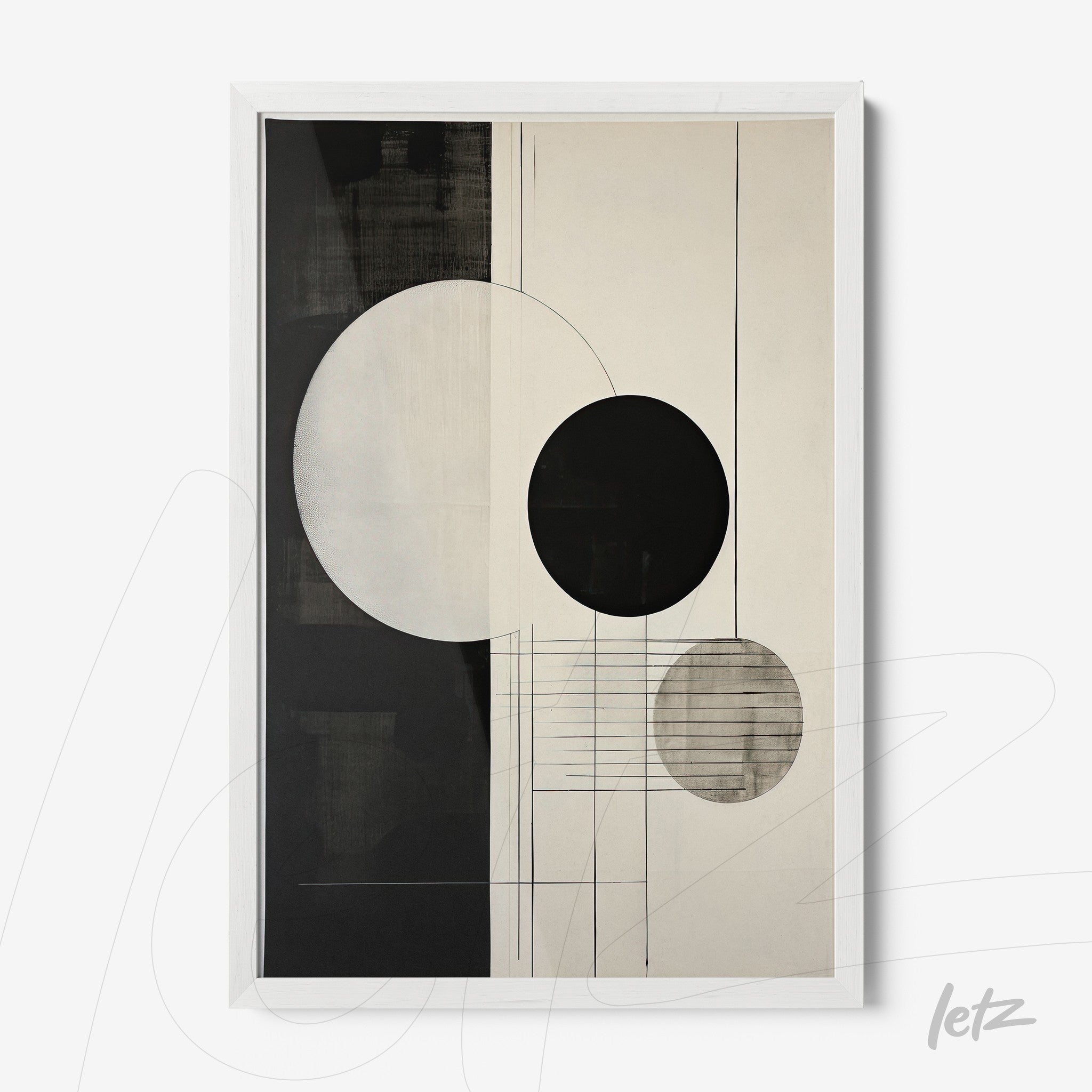 framed abstract artwork in white frame featuring black and gray circles on a light background