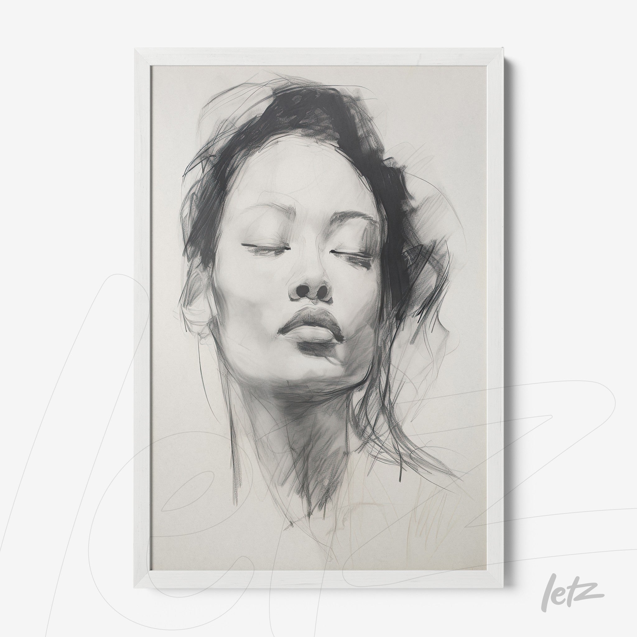 framed wall art featuring a black and white illustration of a female face with a white frame