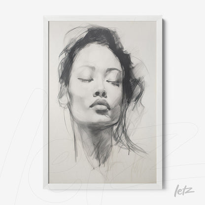 framed wall art featuring a black and white illustration of a female face with a white frame