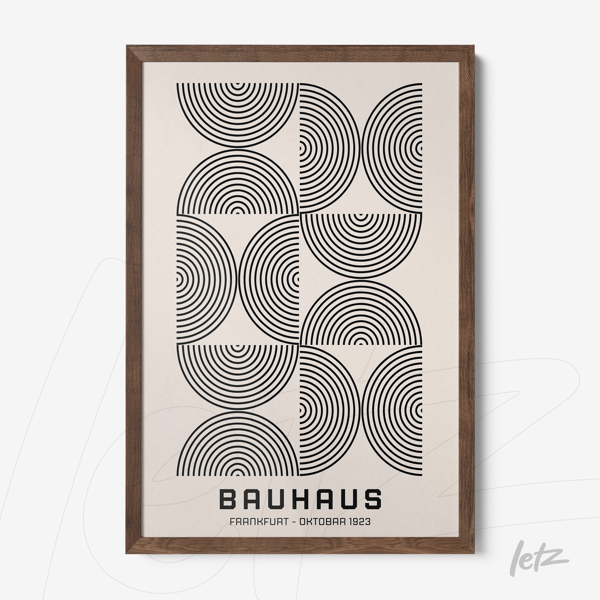wood-framed wall art featuring geometric Bauhaus style with black concentric circles on a light background
