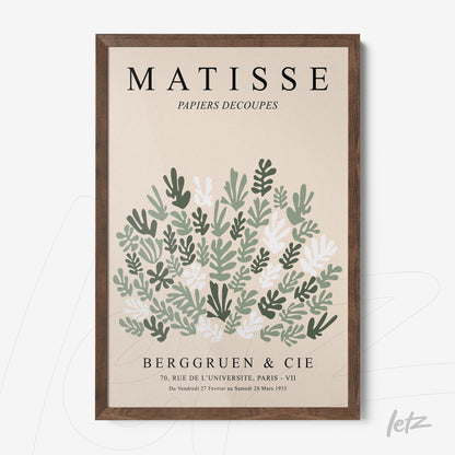 framed art featuring green and white leaves inspired by Matisse with a dark wooden frame