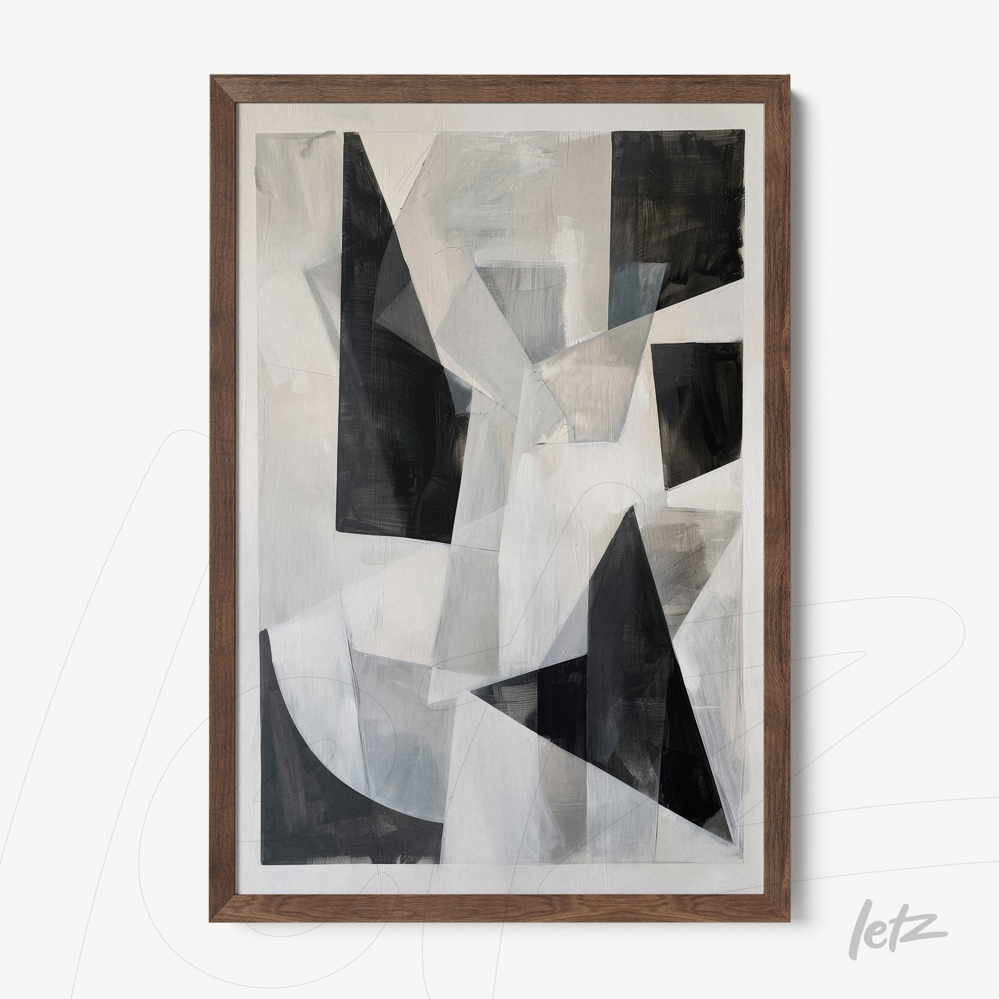 abstract art wall art in shades of black, gray, and white with a light wood frame