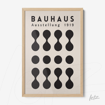 poster print with bauhaus style geometric design from 1919 in light wood frame