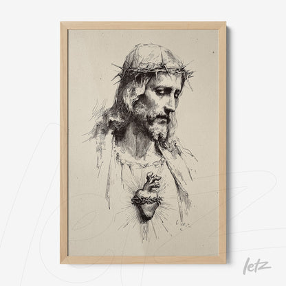 framed artwork with light wood border featuring a black and white drawing of Jesus Christ with a crown of thorns and sacred heart