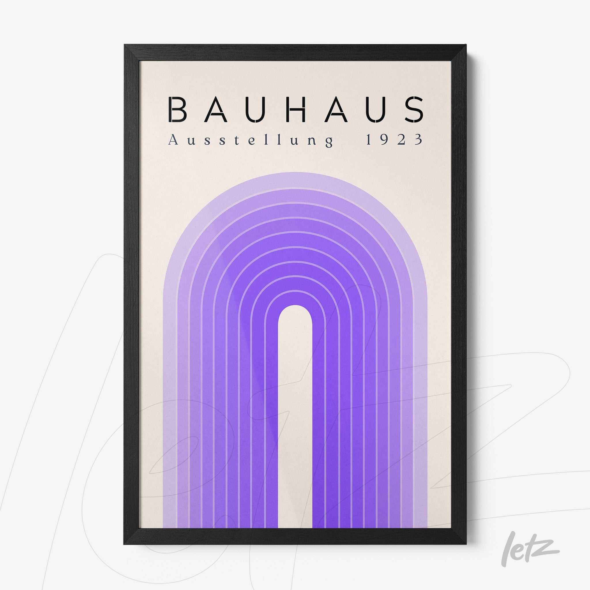 framed geometric artwork in shades of purple with black text reading 'bauhaus ausstellung 1923' in black frame