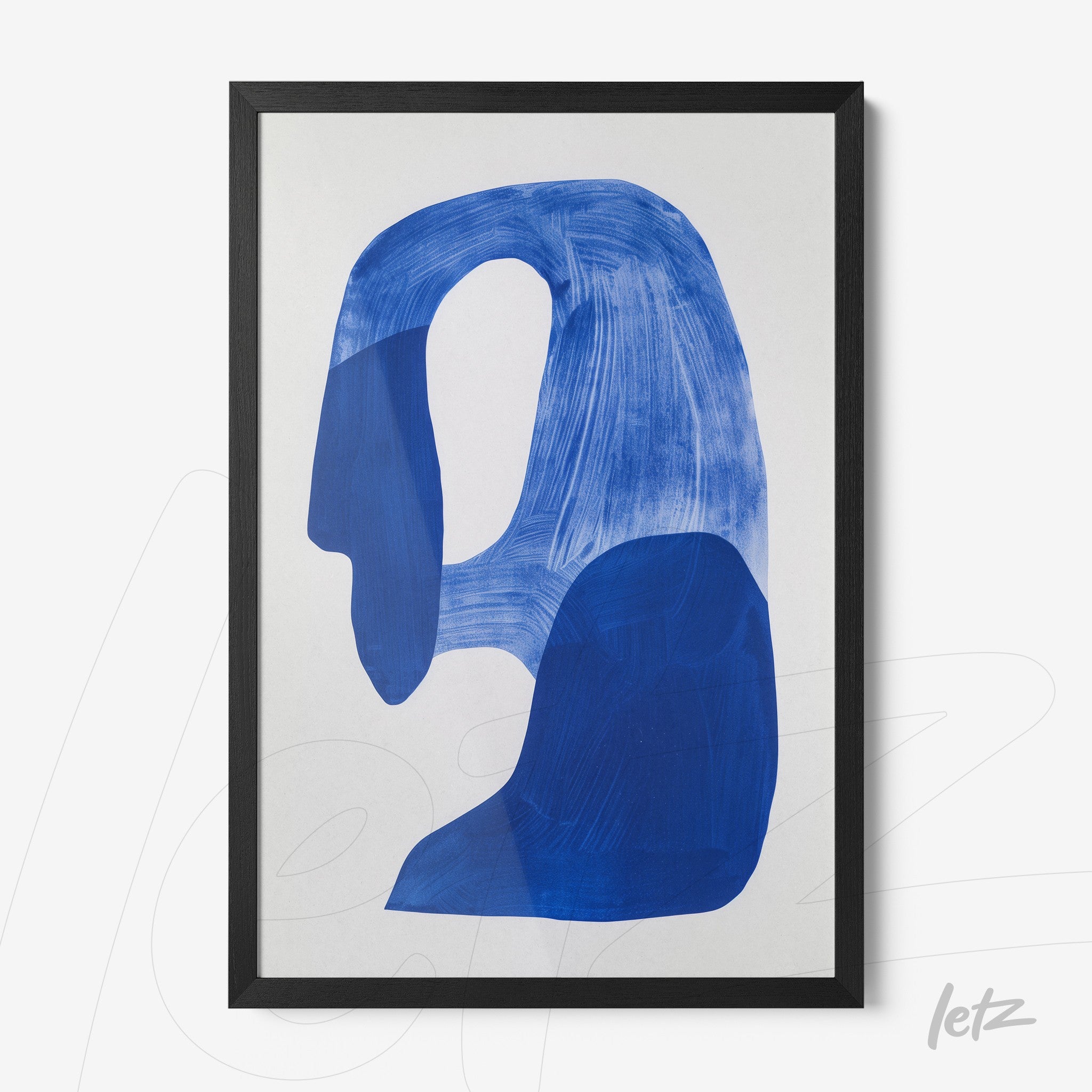 framed abstract art piece in shades of blue with a black frame and white background