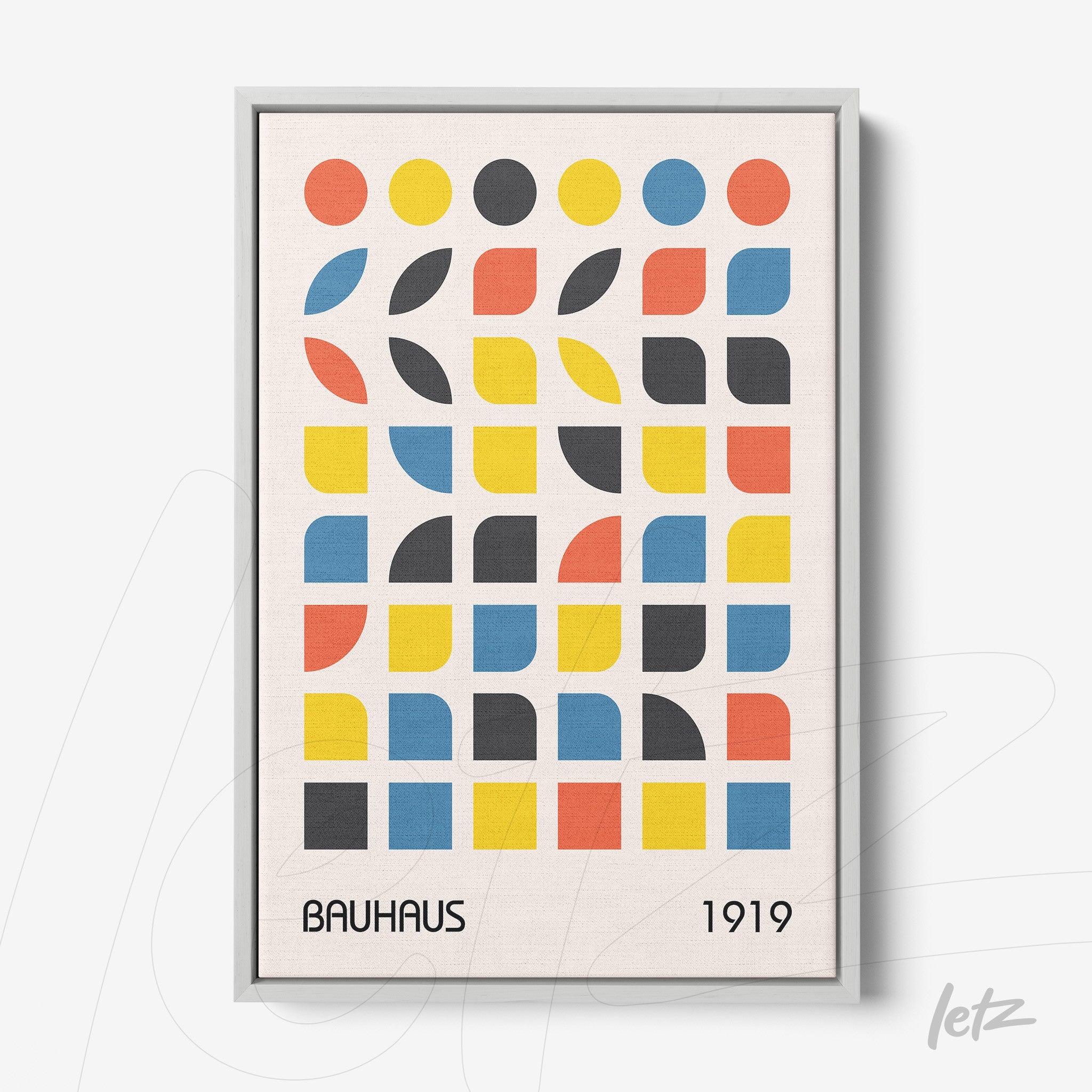 canvas artwork featuring colorful geometric shapes in bauhaus style with a thin light frame