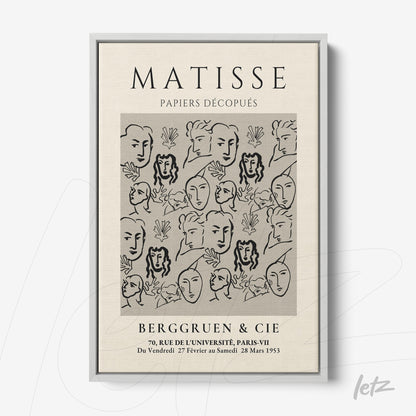 framed artwork featuring matisse style faces in black lines on light background with gray frame