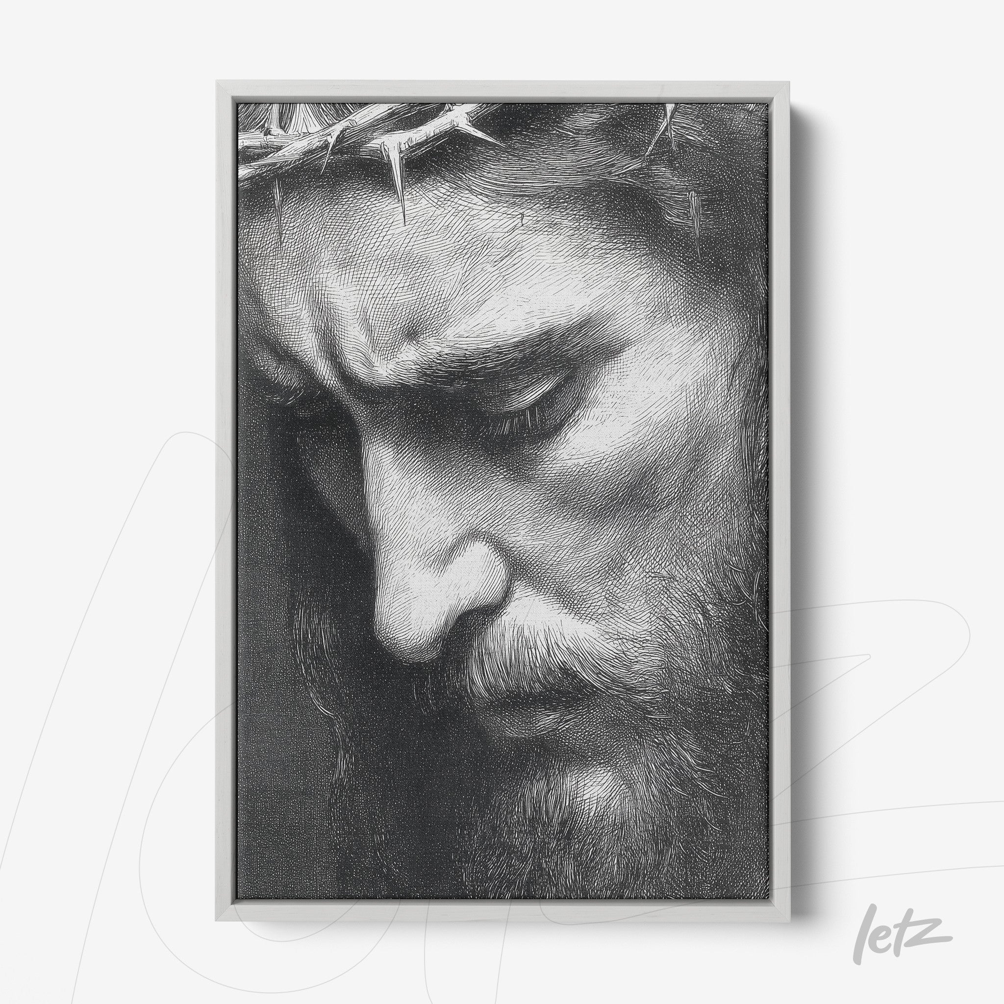 black and white framed portrait of a man with a contemplative expression and a crown of thorns