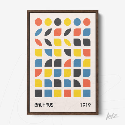 framed geometric Bauhaus style art with colorful squares and circles in a dark frame