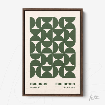 poster print featuring green geometric pattern and text 'bauhaus exhibition' in wooden frame