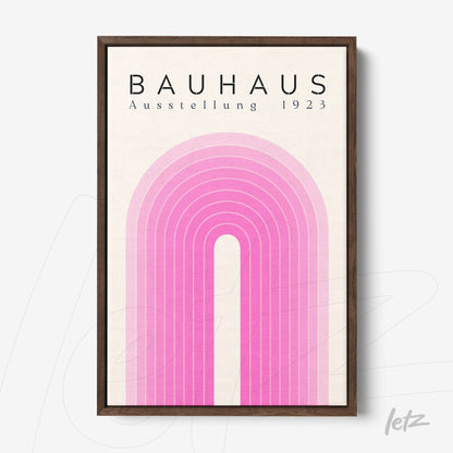 poster print featuring geometric design in shades of pink with dark wood frame