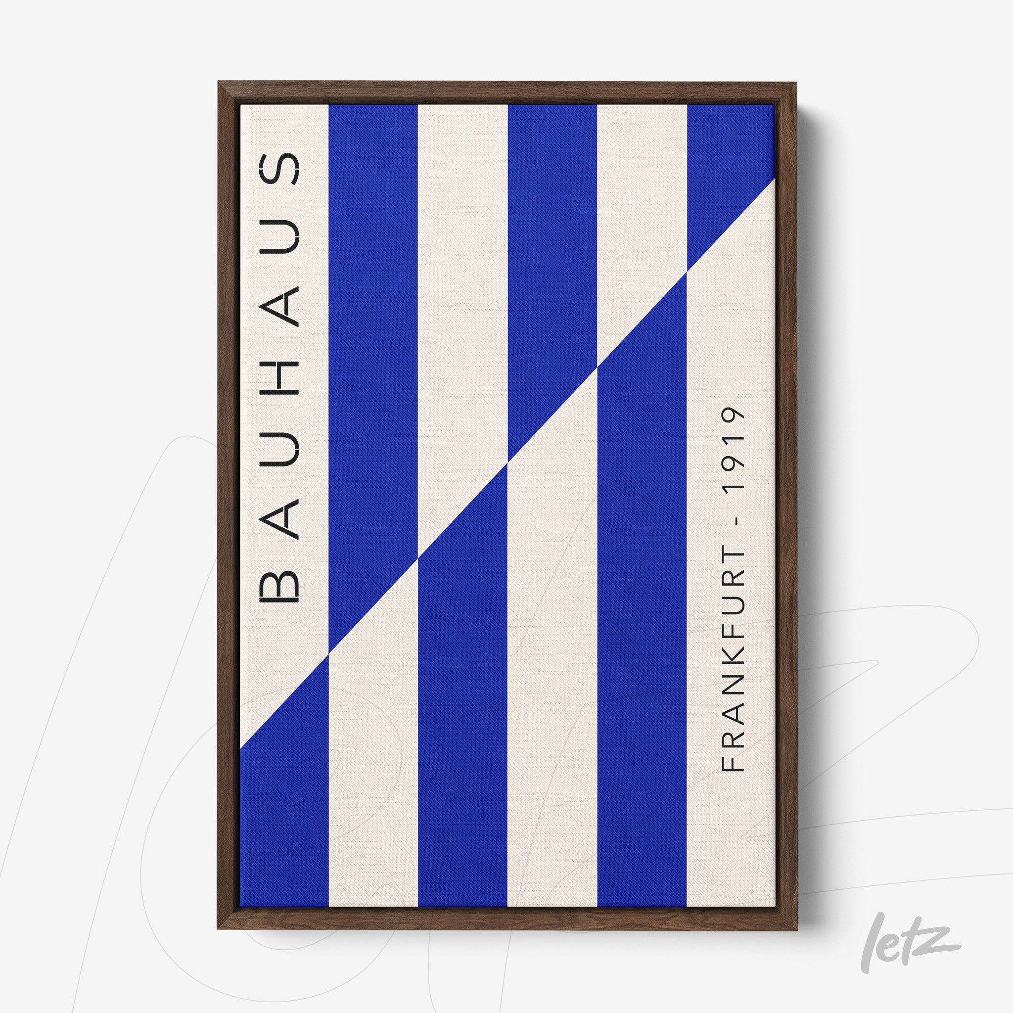 poster print featuring geometric blue and white Bauhaus style design in a dark wood frame