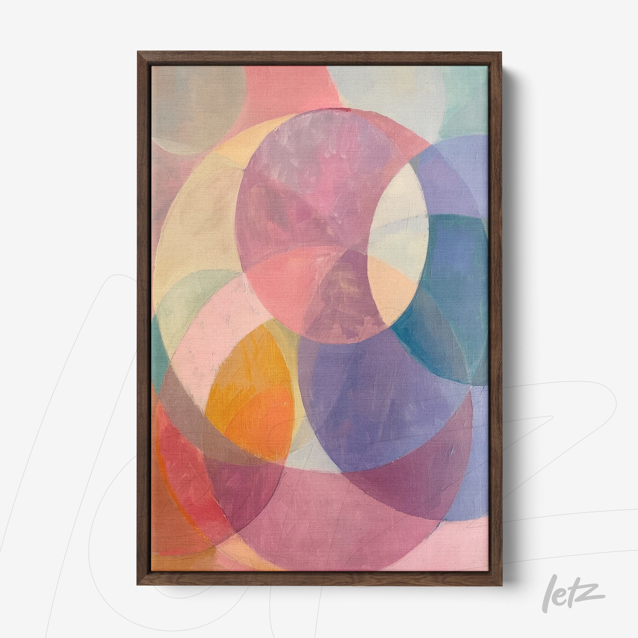 framed wall art featuring abstract overlapping circles in pastel colors with dark frame