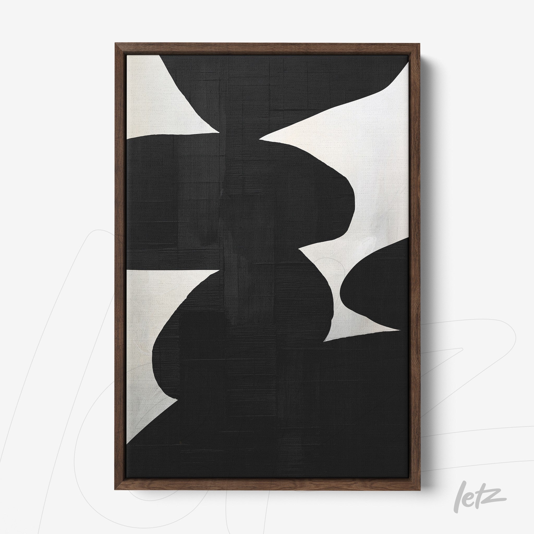 abstract wall art in black and white with dark wooden frame