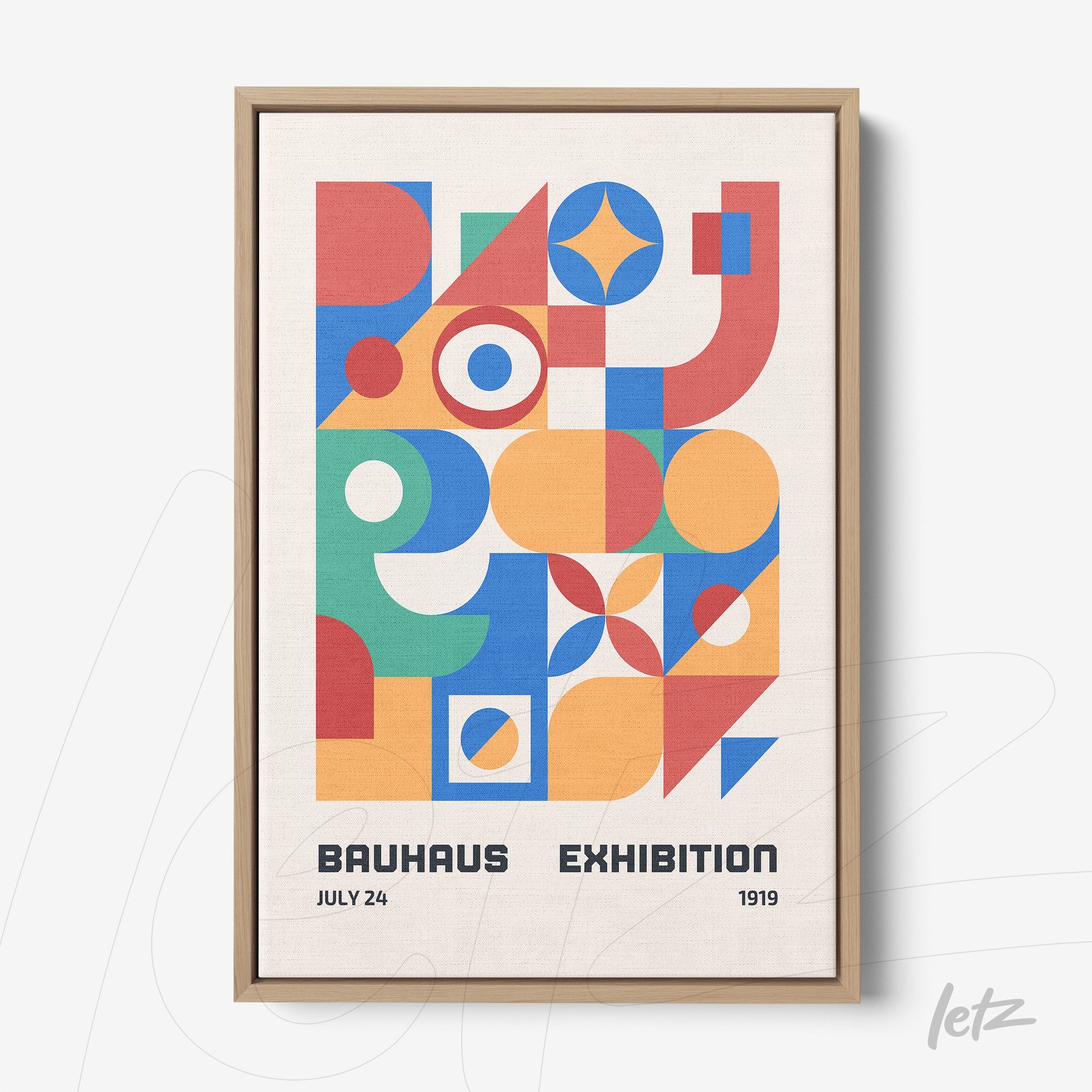canvas print featuring colorful geometric Bauhaus-style art in a light wood frame