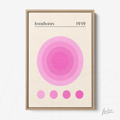 poster with geometric design of pink circles on beige background with light wood frame
