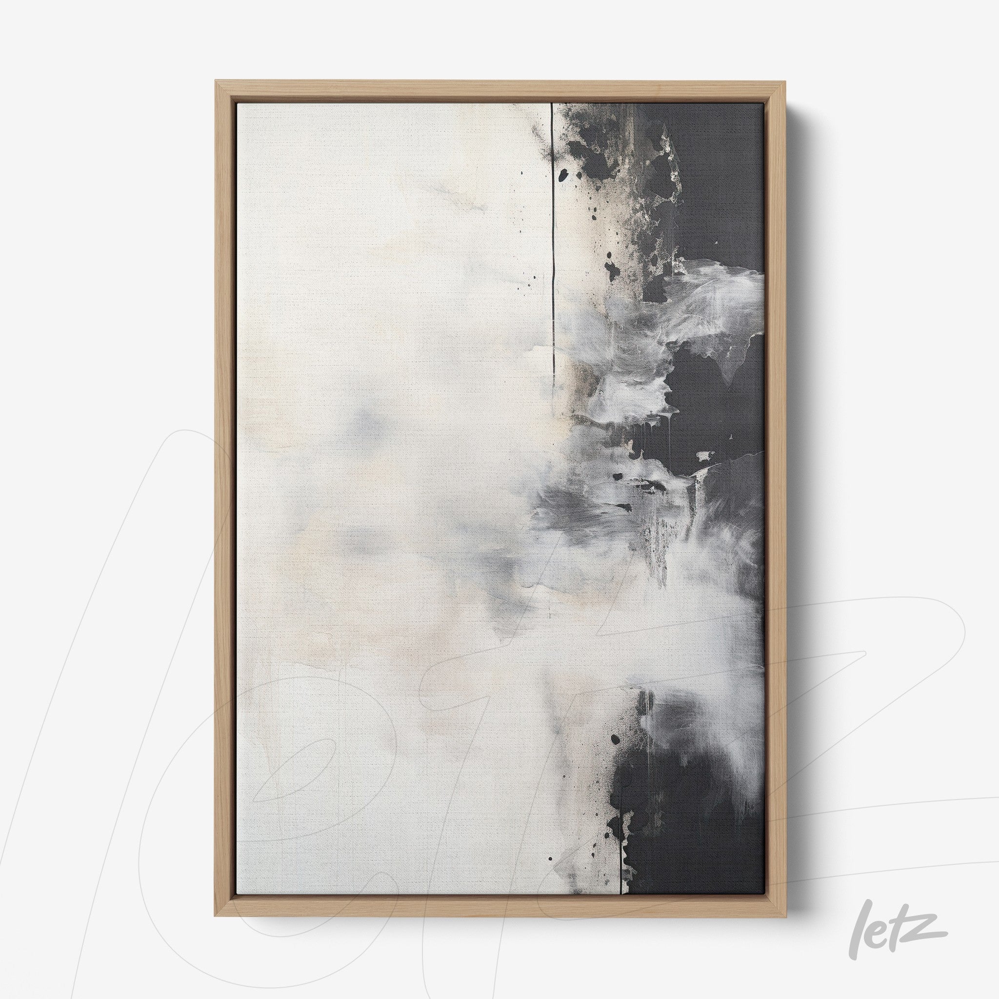 abstract wall art in white and black tones with light wood frame