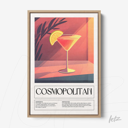 modern style framed artwork of cosmopolitan cocktail with light wood frame and colorful background