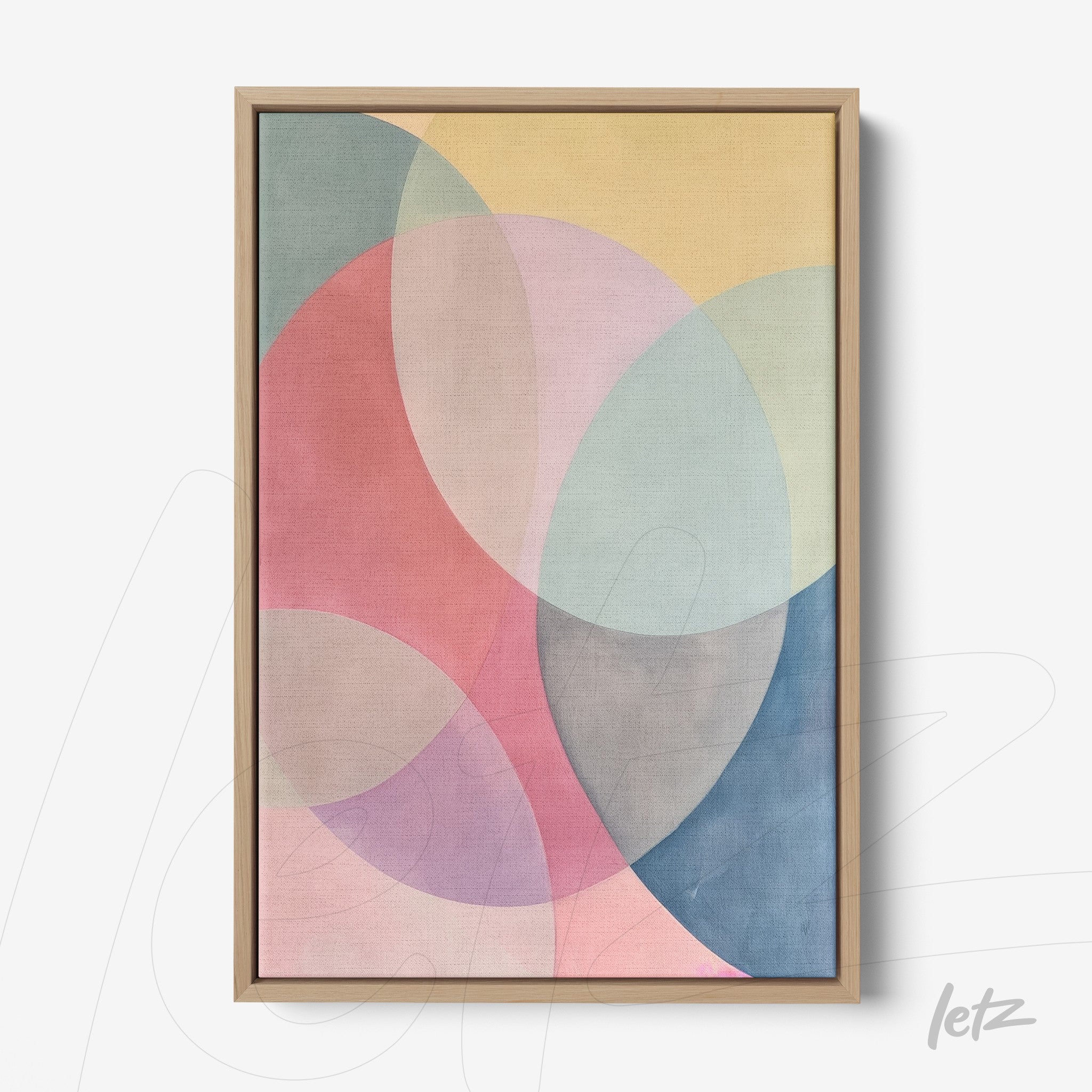 framed artwork featuring abstract shapes in soft colors, showcasing circular forms against a yellow background with a light wood frame