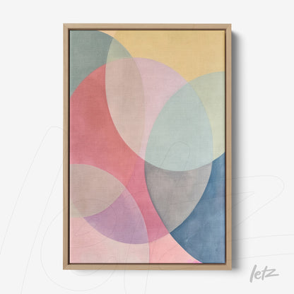 framed artwork featuring abstract shapes in soft colors, showcasing circular forms against a yellow background with a light wood frame