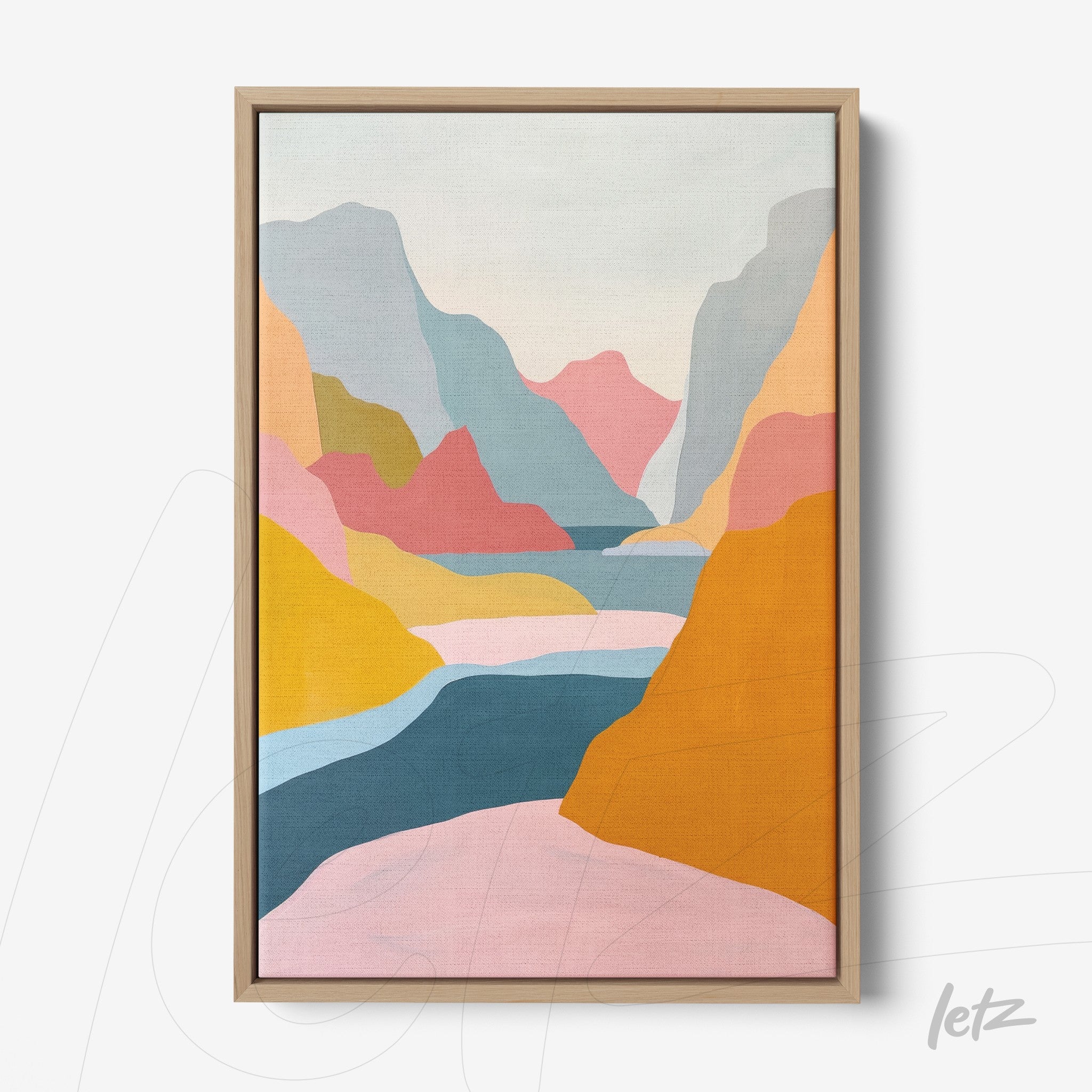 framed abstract artwork of colorful mountains in light wood frame