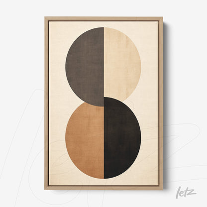 abstract wall art featuring two overlapping circles in earthy tones with light wood frame